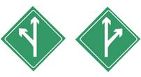 圖中標志是分流誘導標志，表示前方有分流車道，車輛應按箭頭方向直行或駛出主車道。