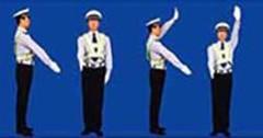 圖中警察手勢為左轉(zhuǎn)彎待轉(zhuǎn)信號。